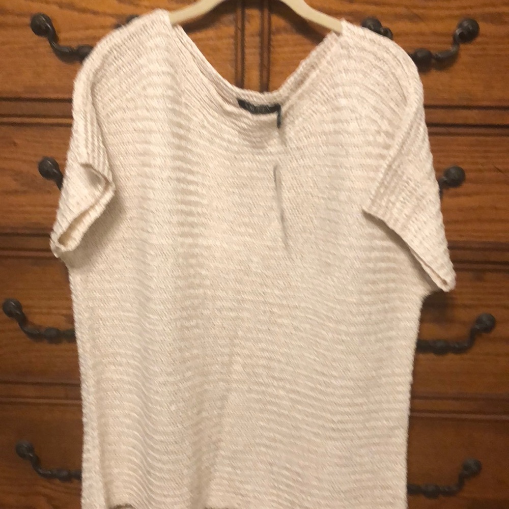 Very short sleeve dressy sweater.